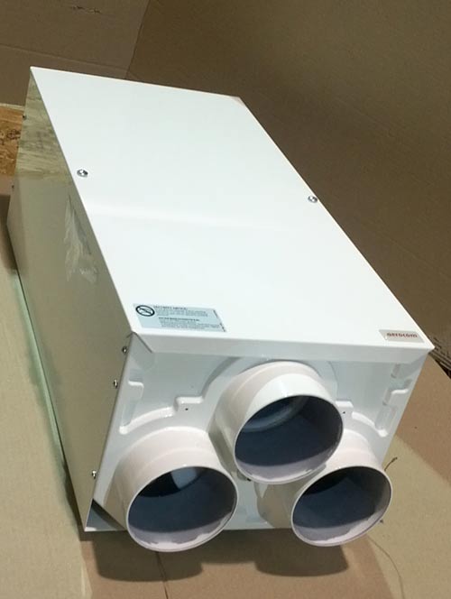 Aerocom diverter, which looks likes a metal rectangular box with three large holes on the face of it.